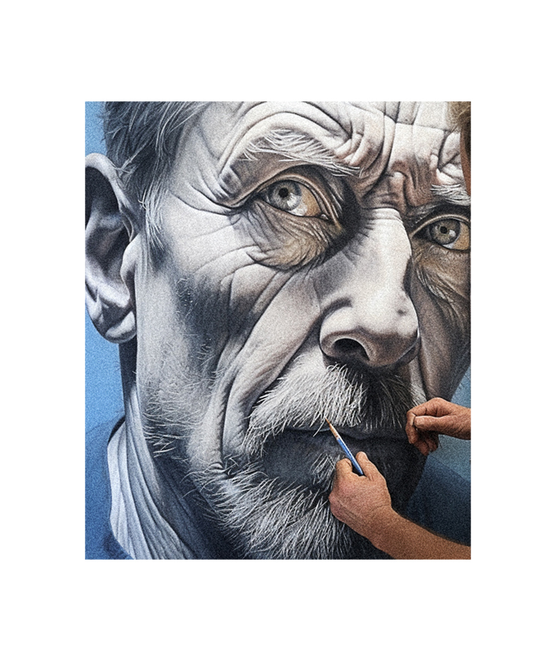 A man is painting a portrait of an old man.