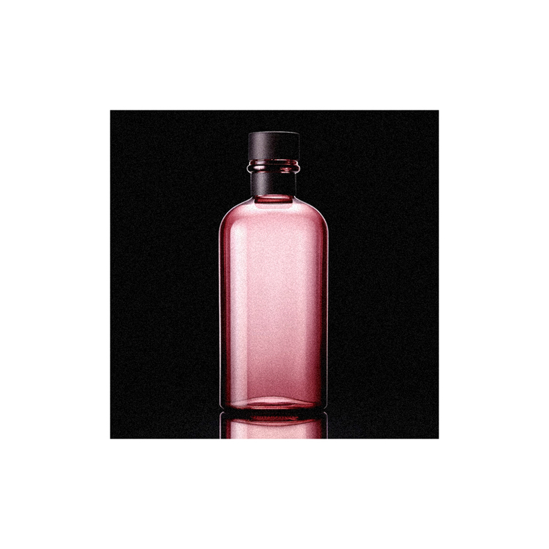 A pink bottle on a black background.