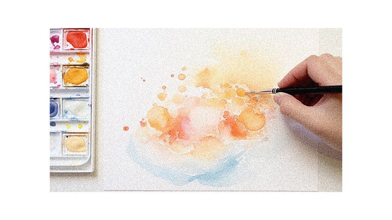 A person is painting a watercolor painting with a brush.